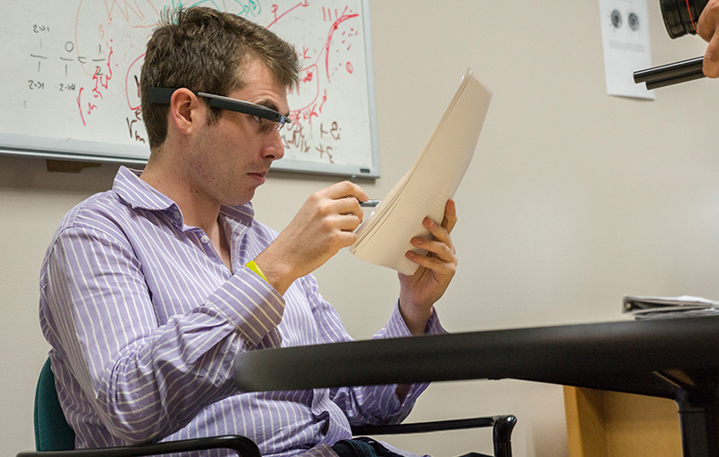 Ph.D. candidate and T.A. Adam Spencer uses Google Glass to record feedback for students.
