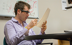 Ph.D. candidate and T.A. Adam Spencer uses Google Glass to record feedback for students.