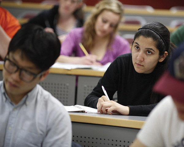 Students taking notes.