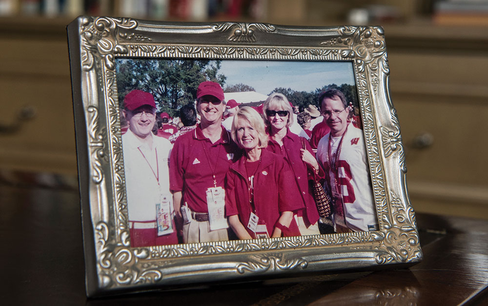 Framed photo of Jeff Diermeier with family and friends at Wisconsin football game