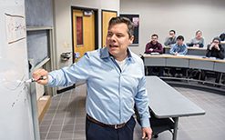 UW School of Business analytics instructor Dani Bauer teaches a class