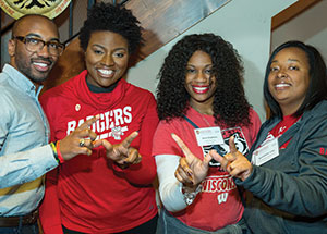 Four WSB's alums flash the 'W' sign