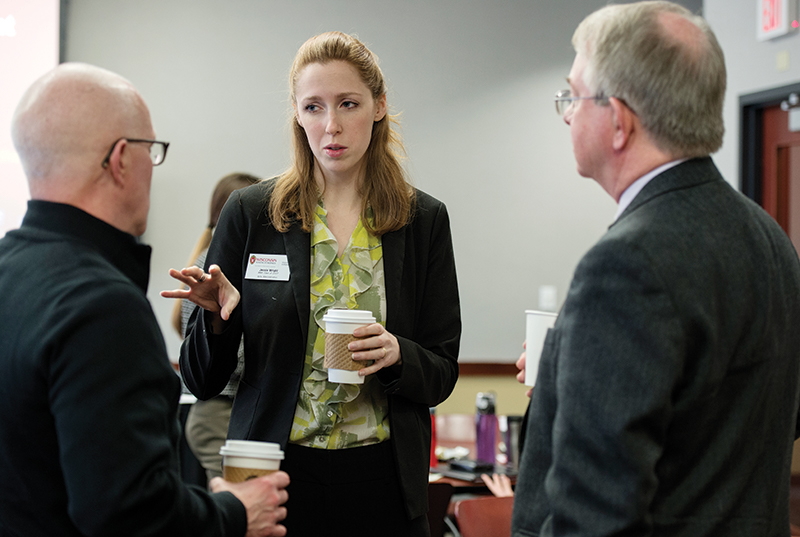 Jessie Wright speaks with staff from the Madison Public Library