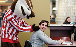 Student receives a back rub from Bucky Badger