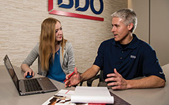 Megan Allen (BBA ’18, MAcc ’19) and Derek Matzke (BBA ’01, MAcc ’02) talk taxes as the season kicks into full gear at BDO’s Madison office