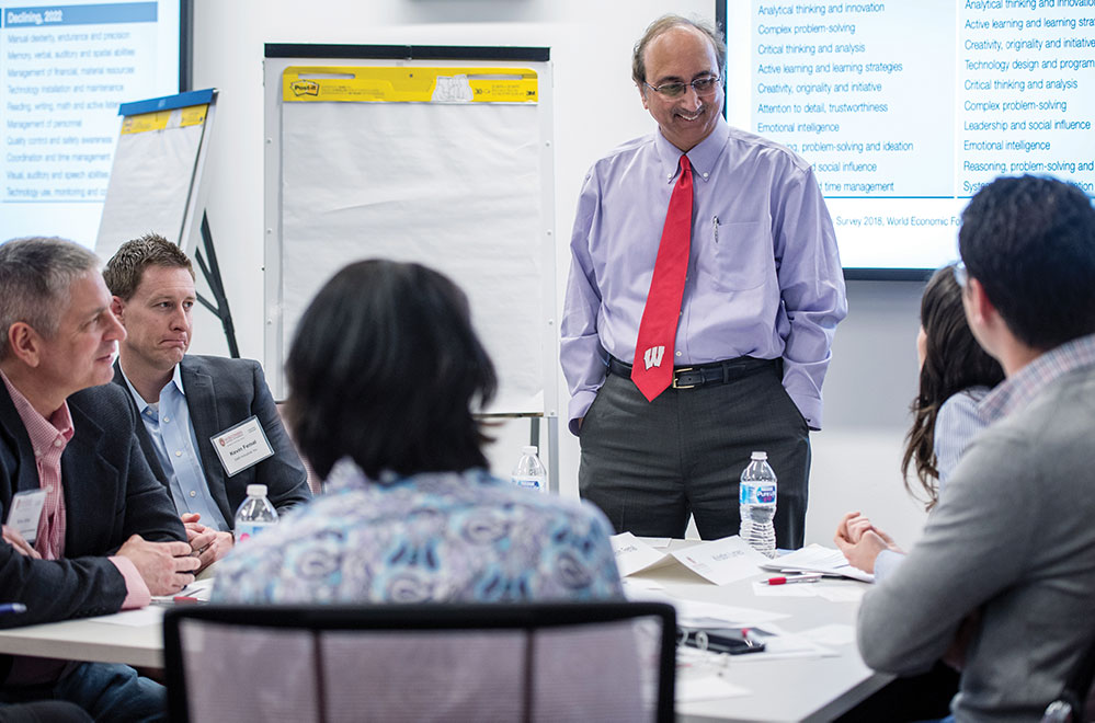 Vallabh 'Samba' Sambamurthy, WSB's next Albert O. Nicholas Dean, leads a group discussion