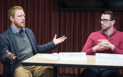Washington Post reporter Jonathan O’Connell moderates a faculty panel discussion featuring Jirs Meuris, assistant professor of management and human resources at UW-Madison.