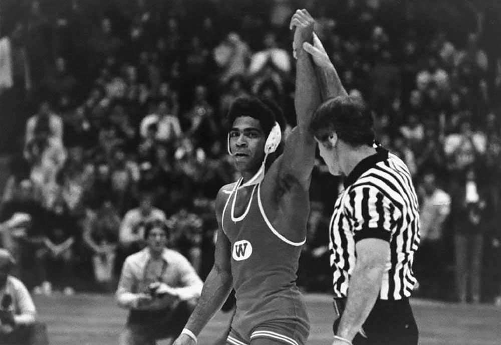 Lee Kemp won three NCAA championships while wrestling for the Badgers.